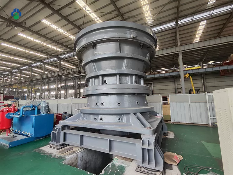 Industrial gyratory crusher machine inspection in workshop for reliable primary crushing performance